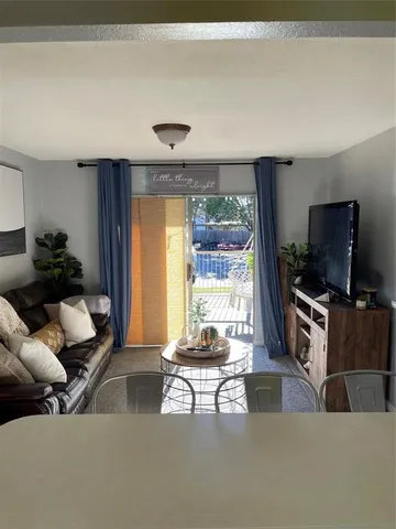 an aerial view of house with yard