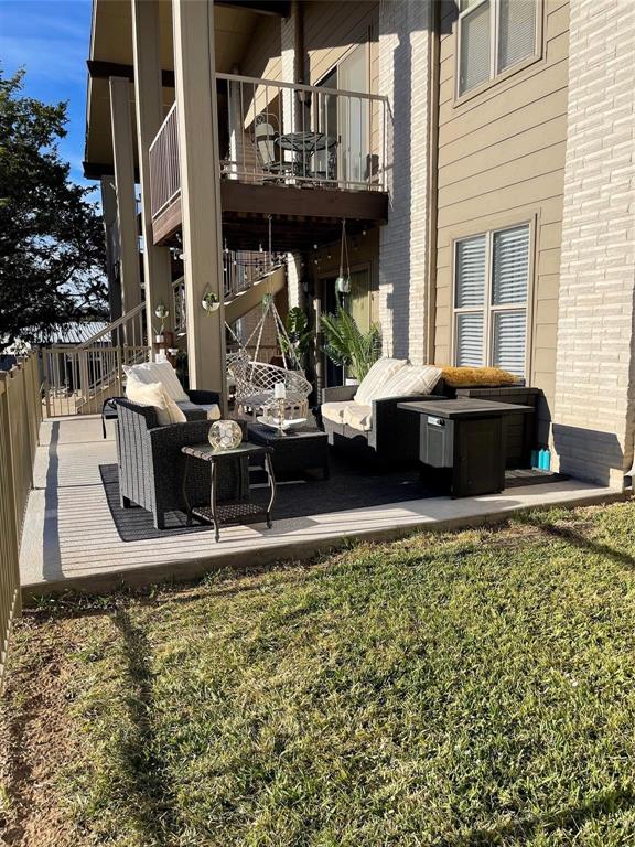 3063 Hells Gate Loop, Unit 23 Strawn, TX 76475 - Photo 19 of 36 a view of a house with backyard and sitting area