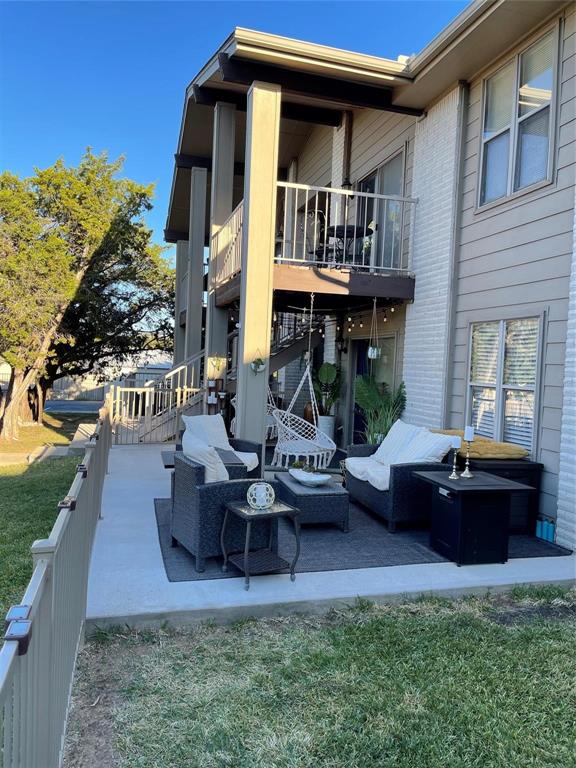 3063 Hells Gate Loop, Unit 23 Strawn, TX 76475 - Photo 22 of 36 a view of house with yard outdoor seating area and barbeque oven