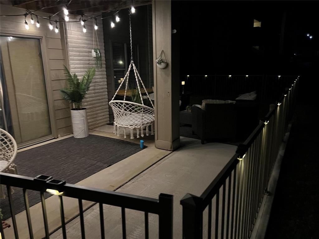 3063 Hells Gate Loop, Unit 23 Strawn, TX 76475 - Photo 24 of 36 a dining room with furniture and wooden floor