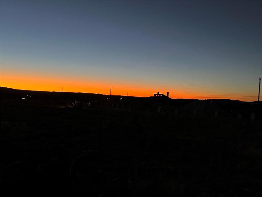 3063 Hells Gate Loop, Unit 23 Strawn, TX 76475 - Photo 26 of 36 a view of a sunset