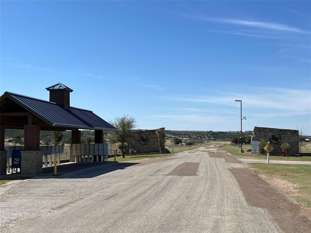 3063 Hells Gate Loop, Unit 23 Strawn, TX 76475 - Photo 31 of 36 a view of street with houses