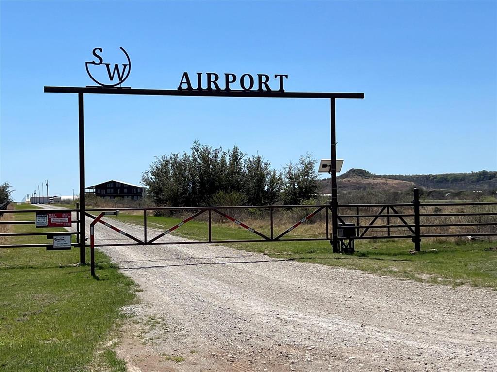 3063 Hells Gate Loop, Unit 23 Strawn, TX 76475 - Photo 32 of 36 a view of outdoor space with seating area