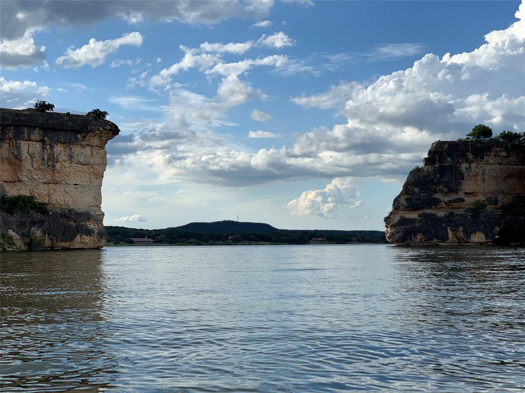 3063 Hells Gate Loop, Unit 23 Strawn, TX 76475 - Photo 36 of 36 a view of a terrace with sky view
