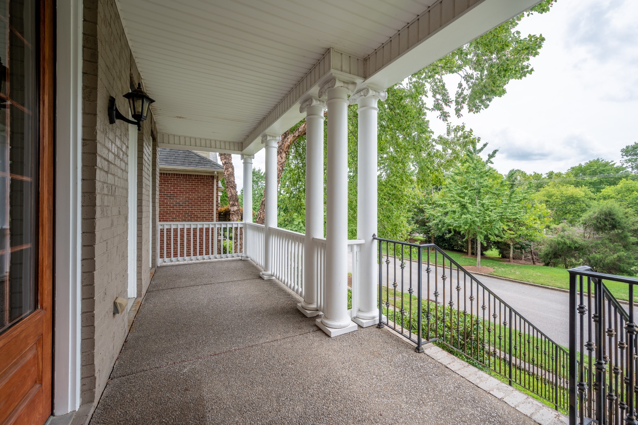 340 Wandering Circle Franklin, TN 37067 - Photo 11 of 51 a view of a porch with wooden floor and outdoor space