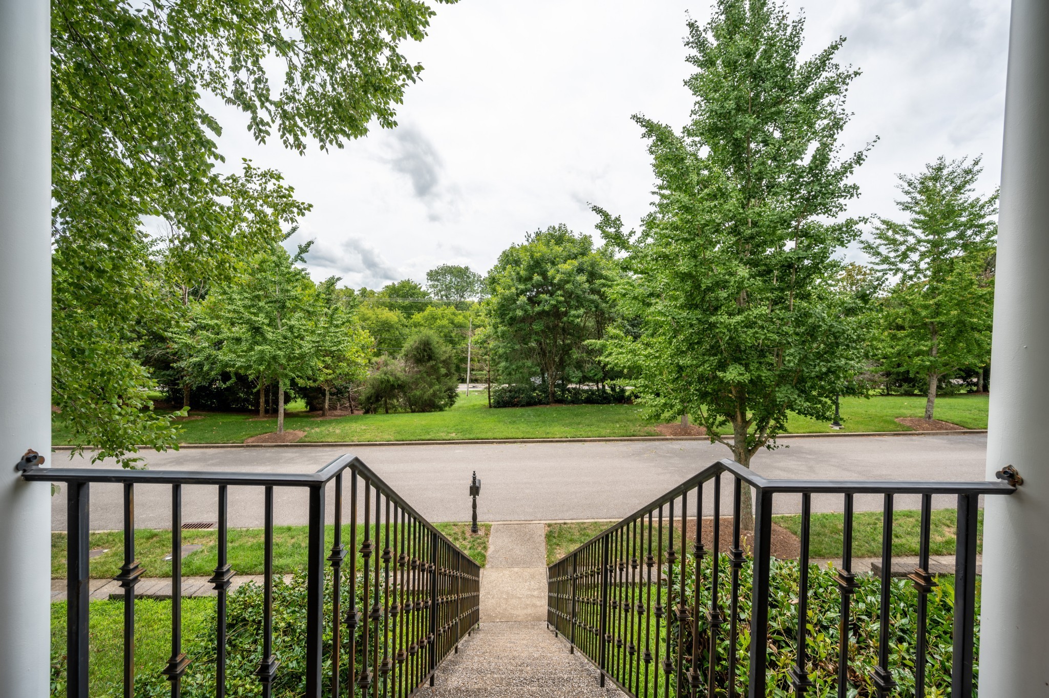 340 Wandering Circle Franklin, TN 37067 - Photo 13 of 51 a view of a balcony with wooden floor and fence