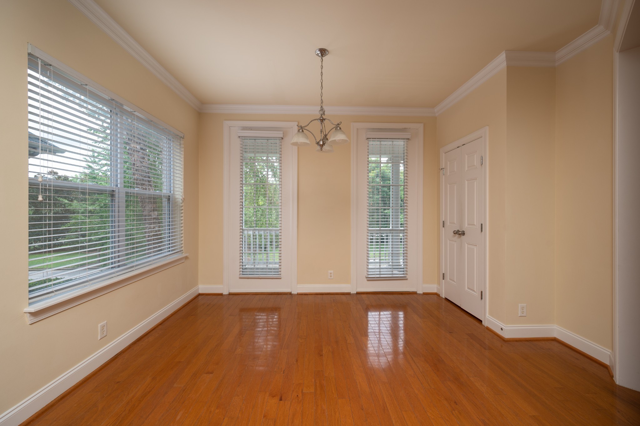 340 Wandering Circle Franklin, TN 37067 - Photo 22 of 51 a view of an empty room with wooden floor and a window