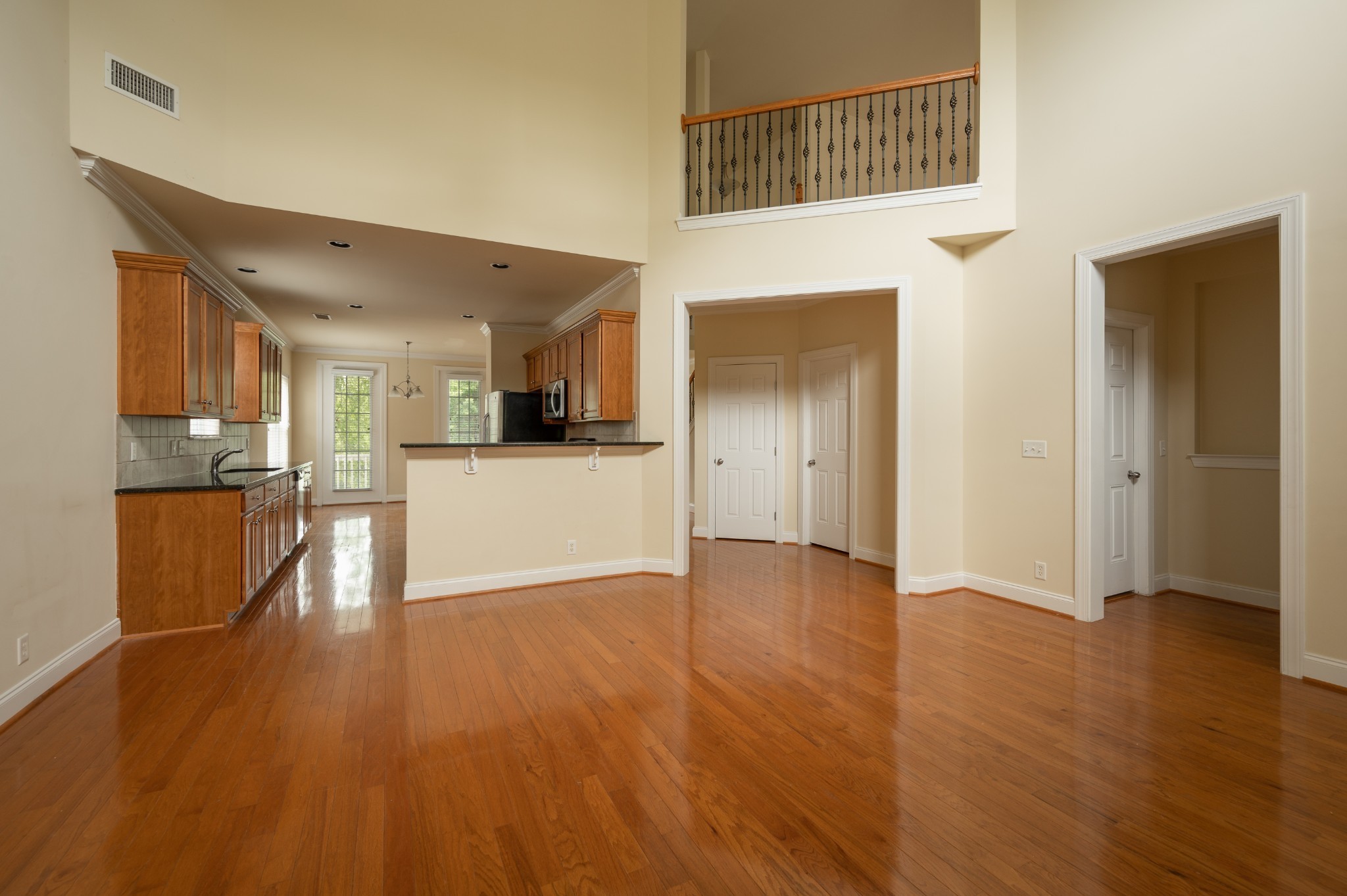 340 Wandering Circle Franklin, TN 37067 - Photo 23 of 51 a view of a kitchen with a sink and a refrigerator