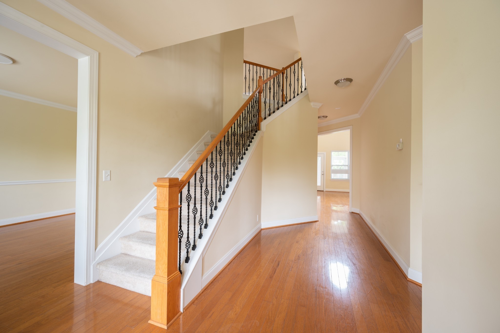 340 Wandering Circle Franklin, TN 37067 - Photo 35 of 51 a view of staircase with wooden floor and white walls