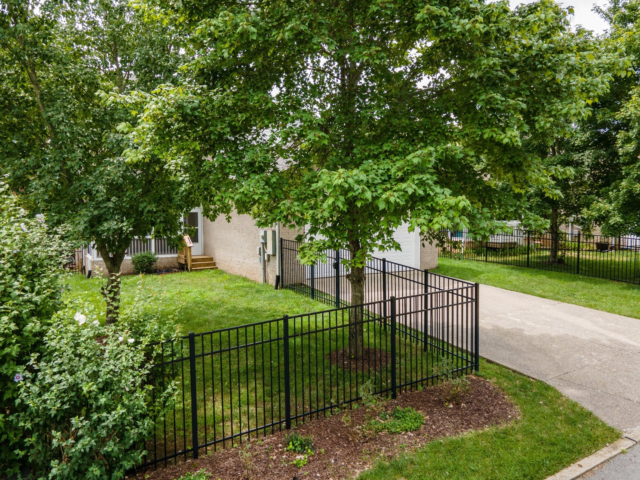340 Wandering Circle Franklin, TN 37067 - Photo 47 of 51 a view of a backyard with a garden