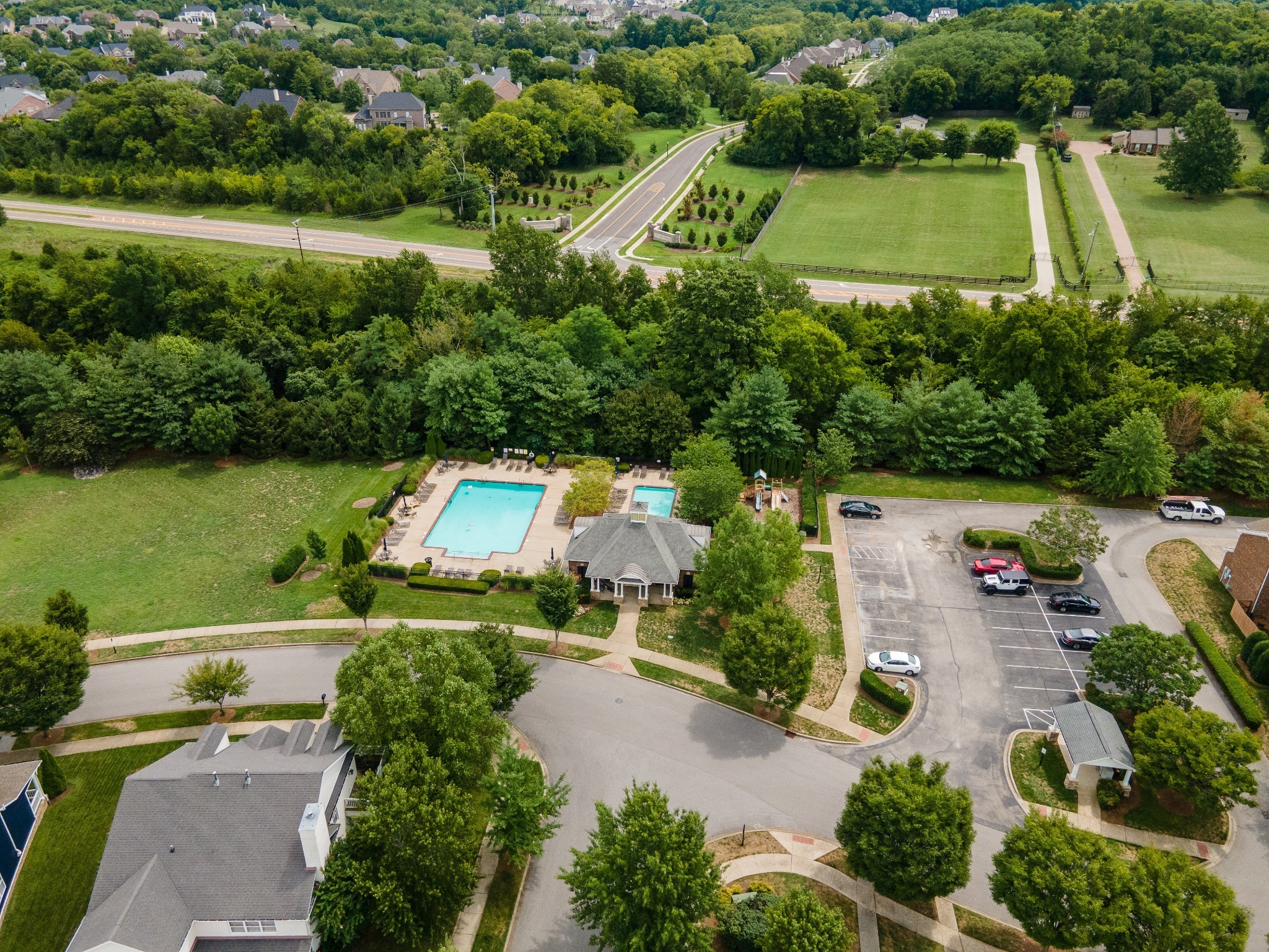 340 Wandering Circle Franklin, TN 37067 - Photo 8 of 51 an aerial view of a house with a garden and lake view