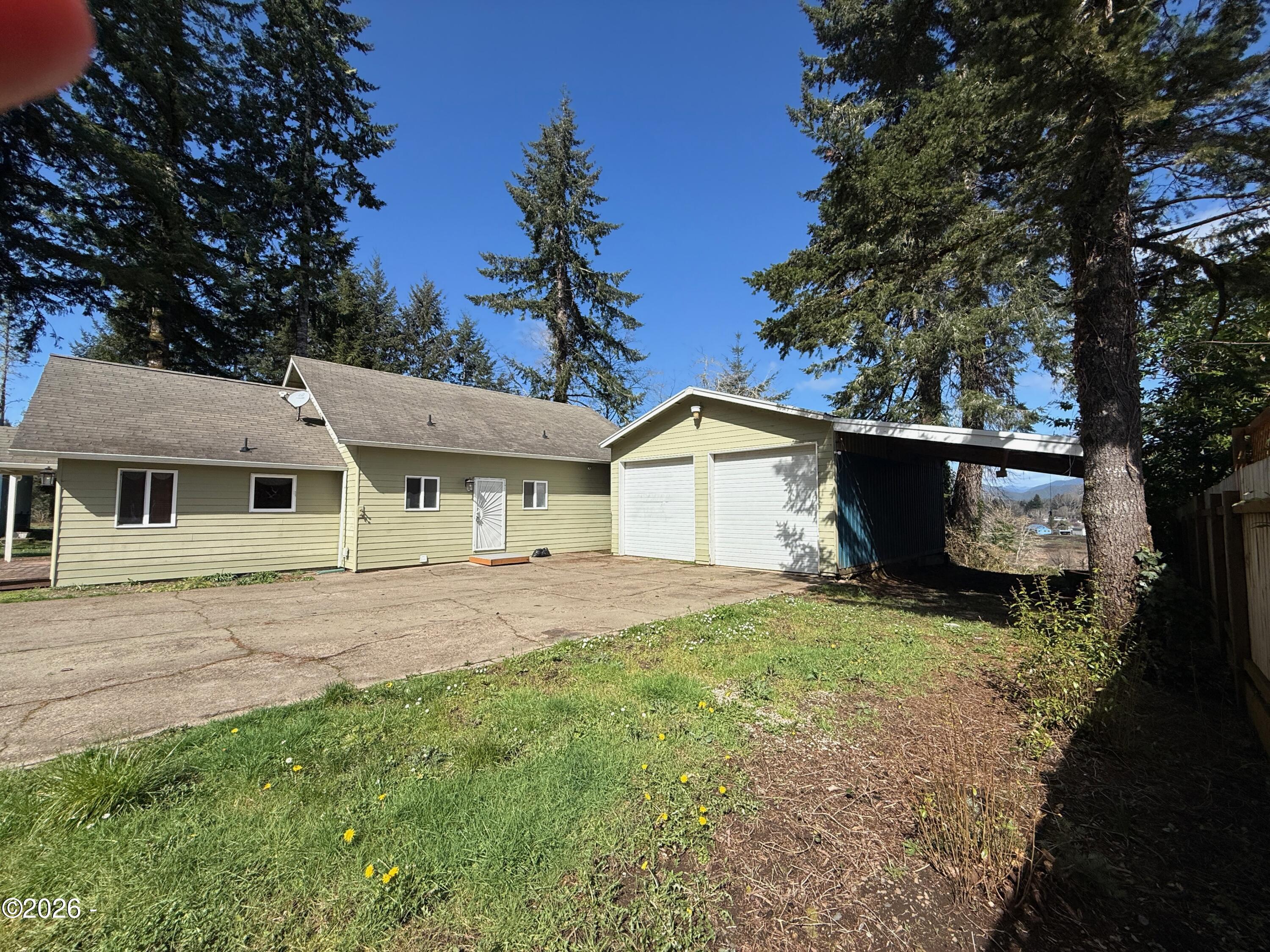 110 Camp 12 Riverside Lane Siletz, OR 97380 - Photo 43 of 48 Large 2 Car Garage with attached carport