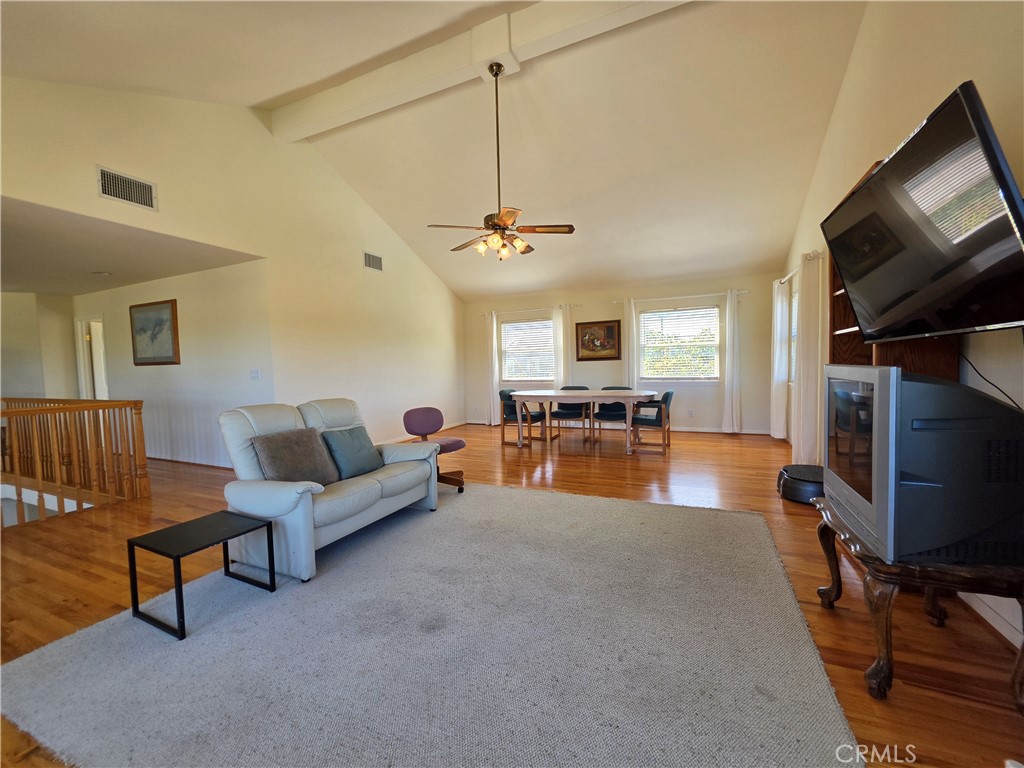 11541 Donovan Road Rossmoor, CA 90720 - Photo 30 of 51 Upstairs vaulted loft/bonus room with hardwood floors