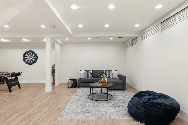 a living room with furniture and a table