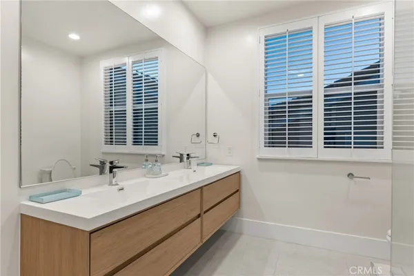 a bathroom with a sink and a shower
