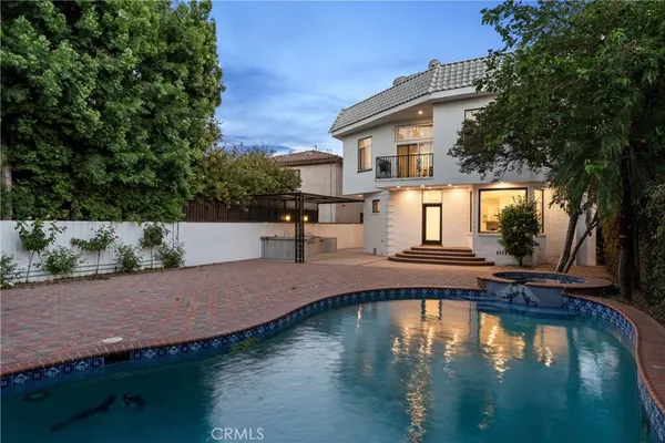a swimming pool view with a outdoor space