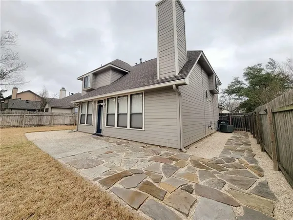 a view of backyard of house