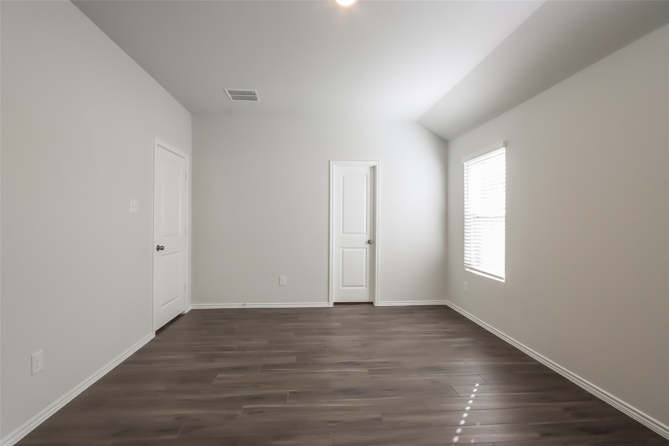 22419 Verdin Road Splendora, TX 77372 - Photo 8 of 17 wooden floor in an empty room