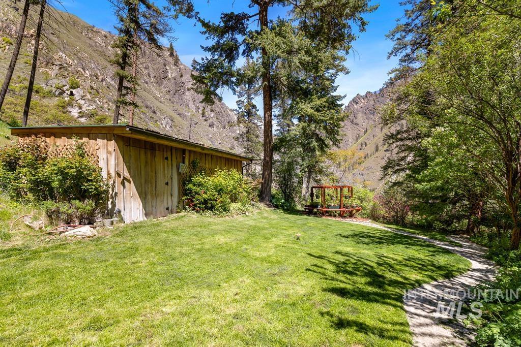 360 Lake Creek Riggins, ID 83549 - Photo 36 of 50 View of green lawn featuring a mountain view