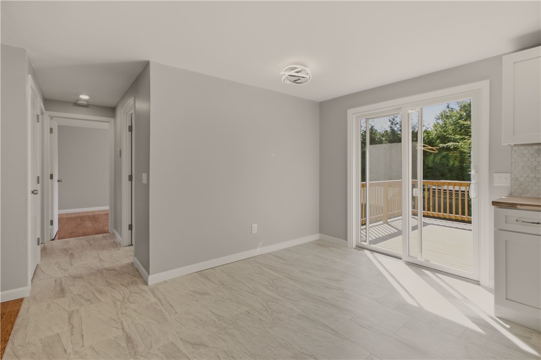 174 Ten Rod Road Exeter, RI 02822 - Photo 15 of 41 Slider takes you out to deck