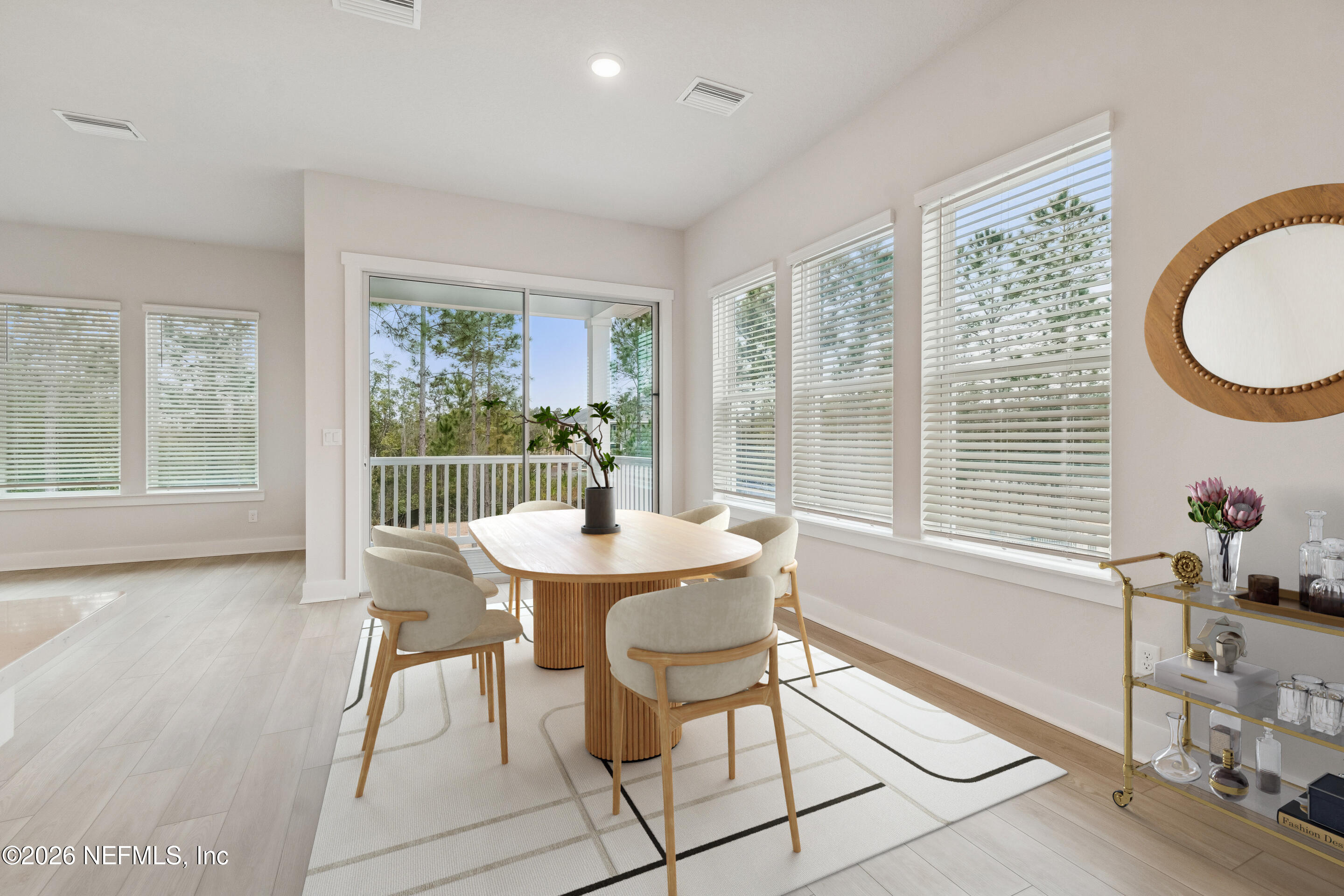 10165 Element Road Jacksonville, FL 32256 - Photo 16 of 25 a dining room with furniture and window