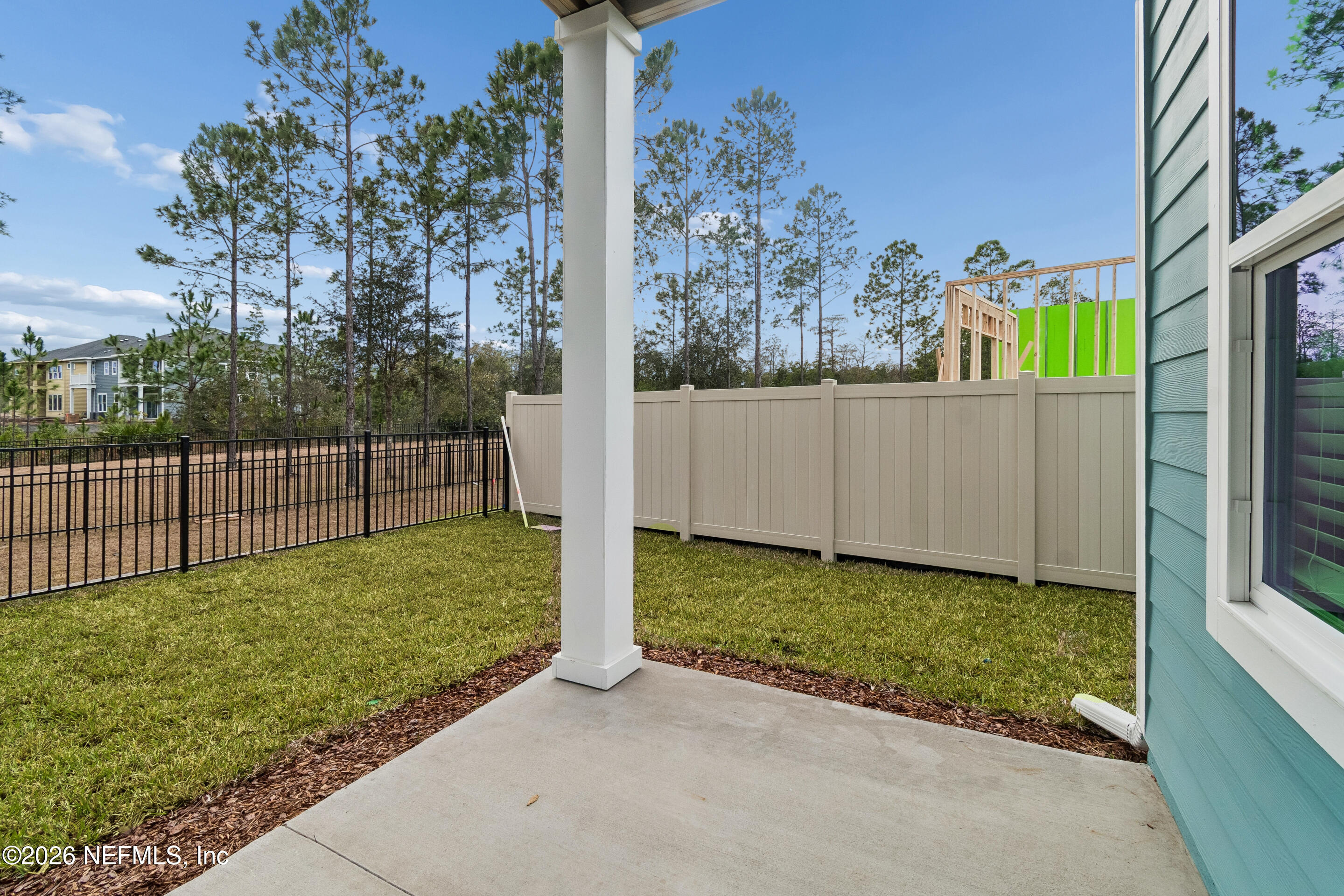 10165 Element Road Jacksonville, FL 32256 - Photo 2 of 25 a view of a backyard with garden