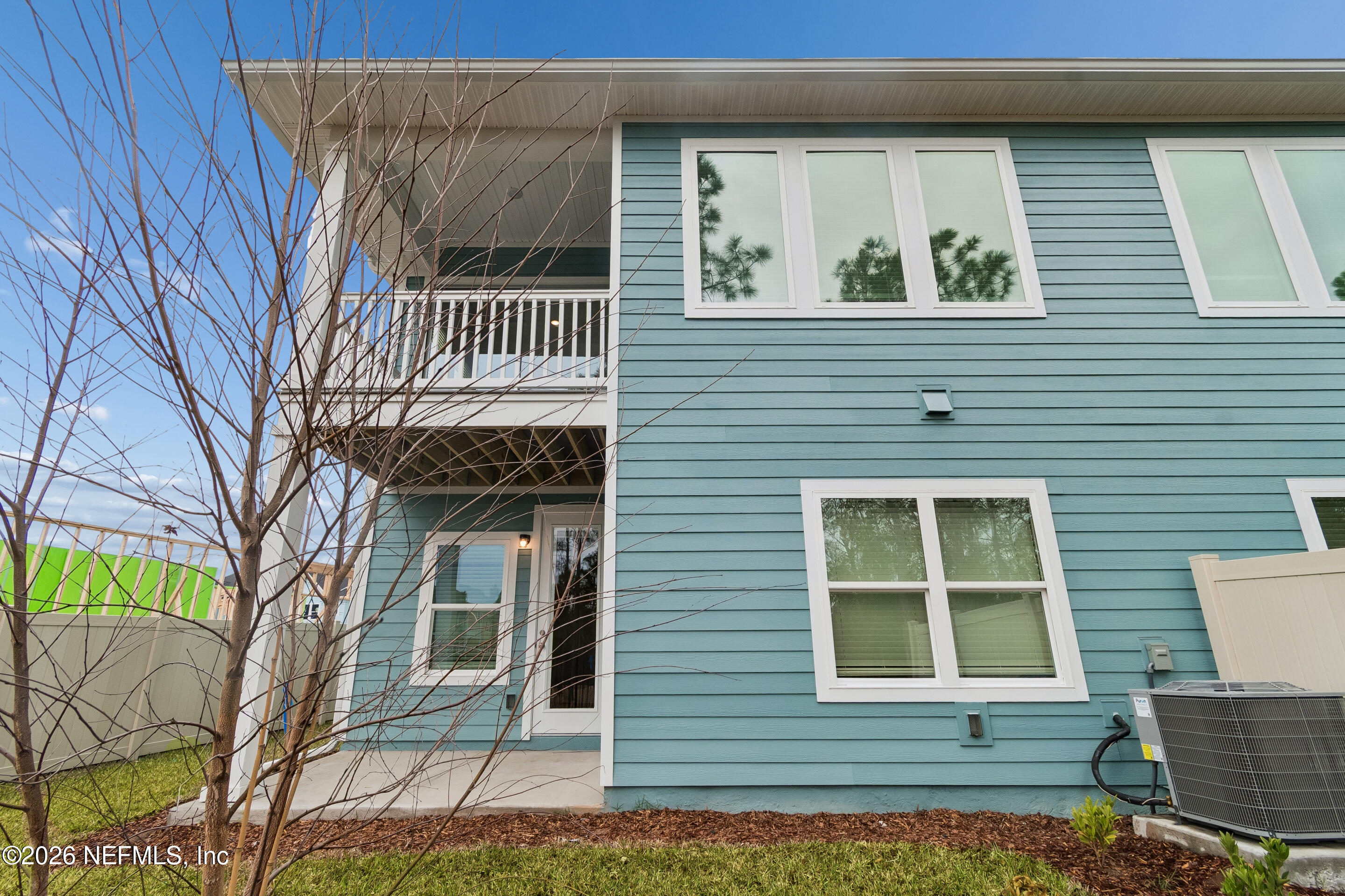10165 Element Road Jacksonville, FL 32256 - Photo 25 of 25 a front view of a house with a yard