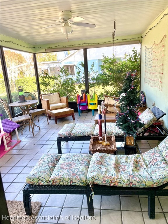 3401 Divot Road Sebring, FL 33872 - Photo 22 of 29 a living room with furniture and a large window