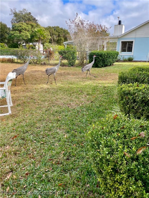 3401 Divot Road Sebring, FL 33872 - Photo 26 of 29 a view of a lake view