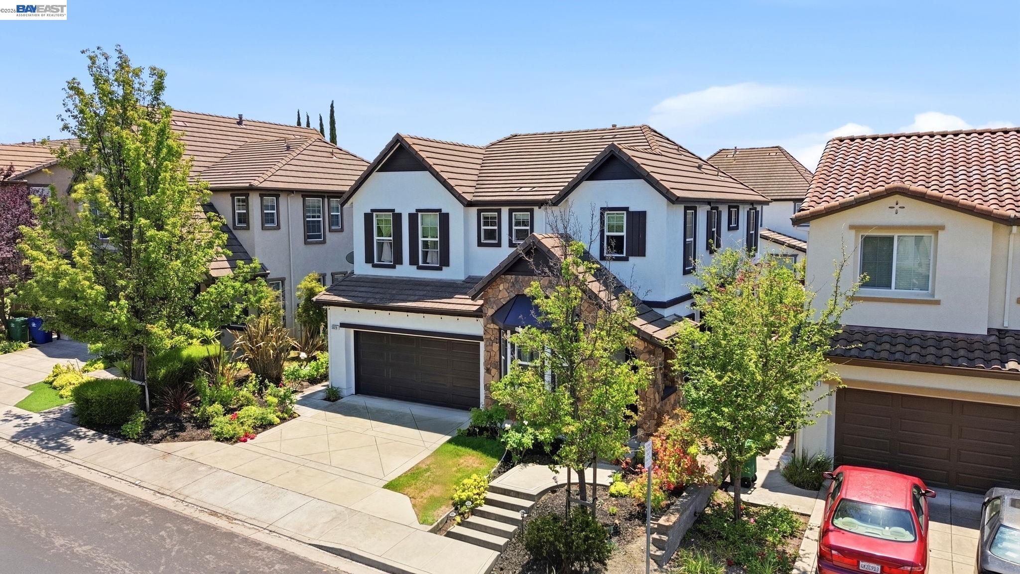 5029 Queensbury Way San Ramon, CA 94582 - Photo 42 of 58 a front view of a house with a garden