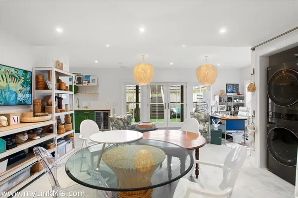 a living room with furniture a rug and a fireplace