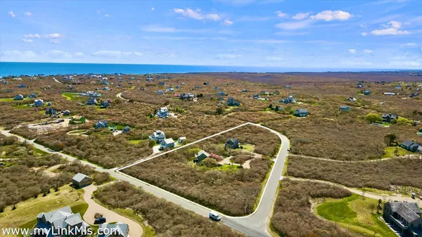 a view of a balcony with an ocean
