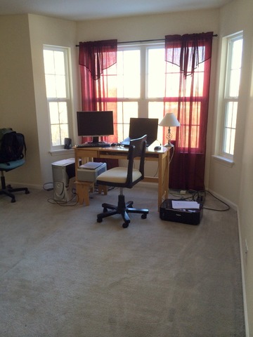 438 North River Road Naperville, IL 60540 - Photo 18 of 24 a view of a livingroom with workspace and a window