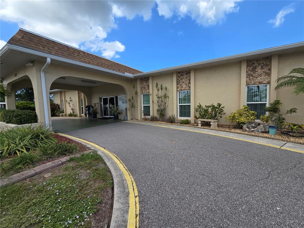 5619 Bayshore Road, Unit 435 Palmetto, FL 34221 - Photo 48 of 56 a view of a house with porch