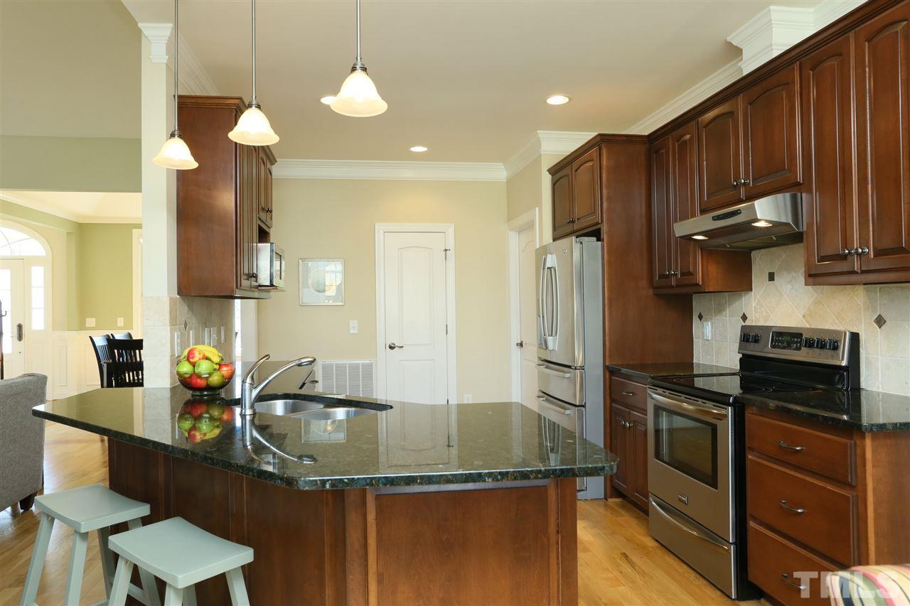 303 May Farm Road Pittsboro, NC 27312 - Photo 7 of 25 Great cabinet and counter space for the everyday cook!