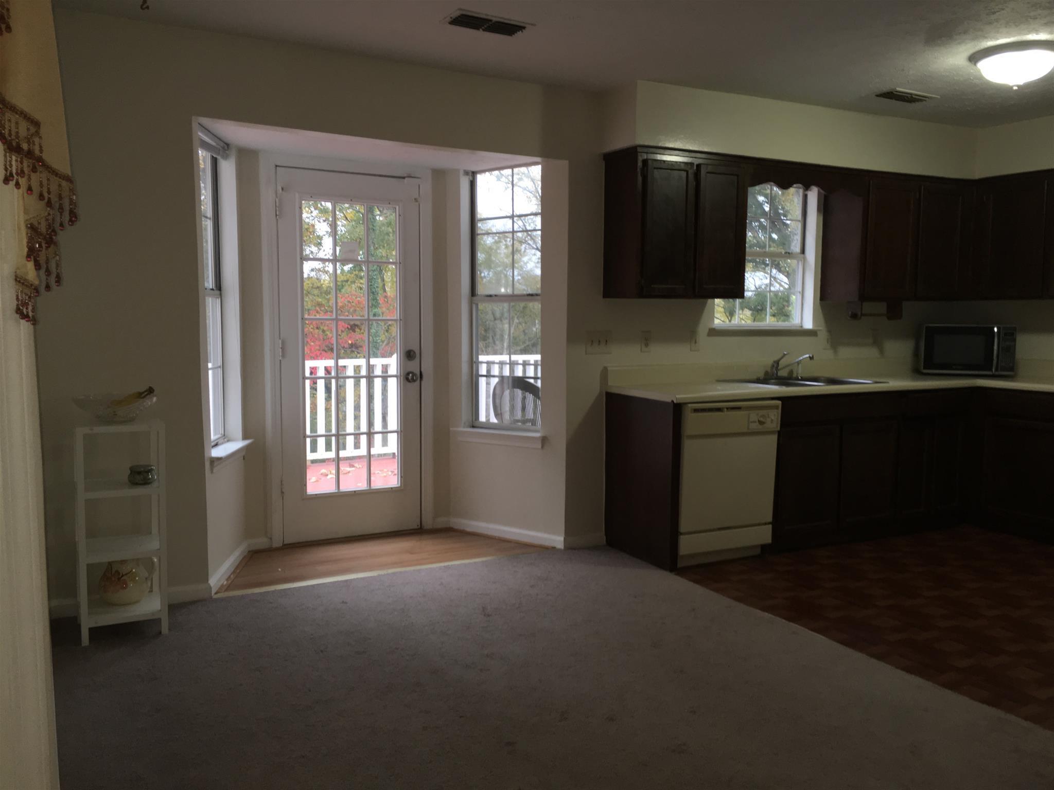 801 Bishopsgate Road Antioch, TN 37013 - Photo 15 of 27 View to kitchen and deck