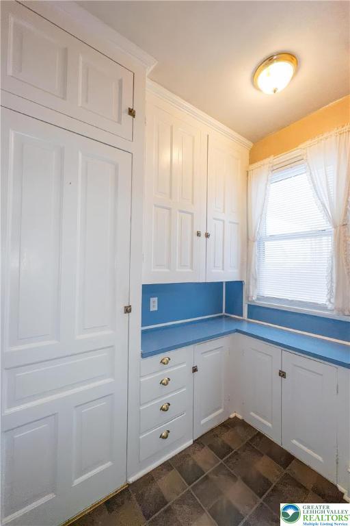 211 East Goepp Street Bethlehem, PA 18018 - Photo 12 of 36 a kitchen with white cabinets and a window