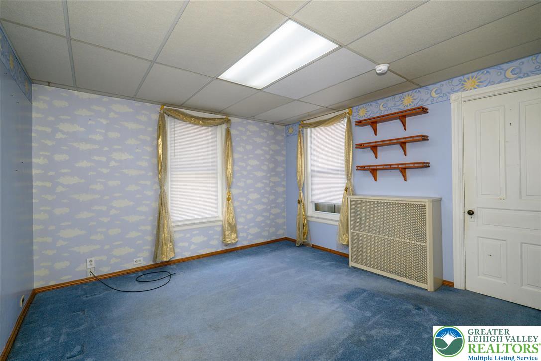 211 East Goepp Street Bethlehem, PA 18018 - Photo 19 of 36 a view of an empty room with a cabinet and a window
