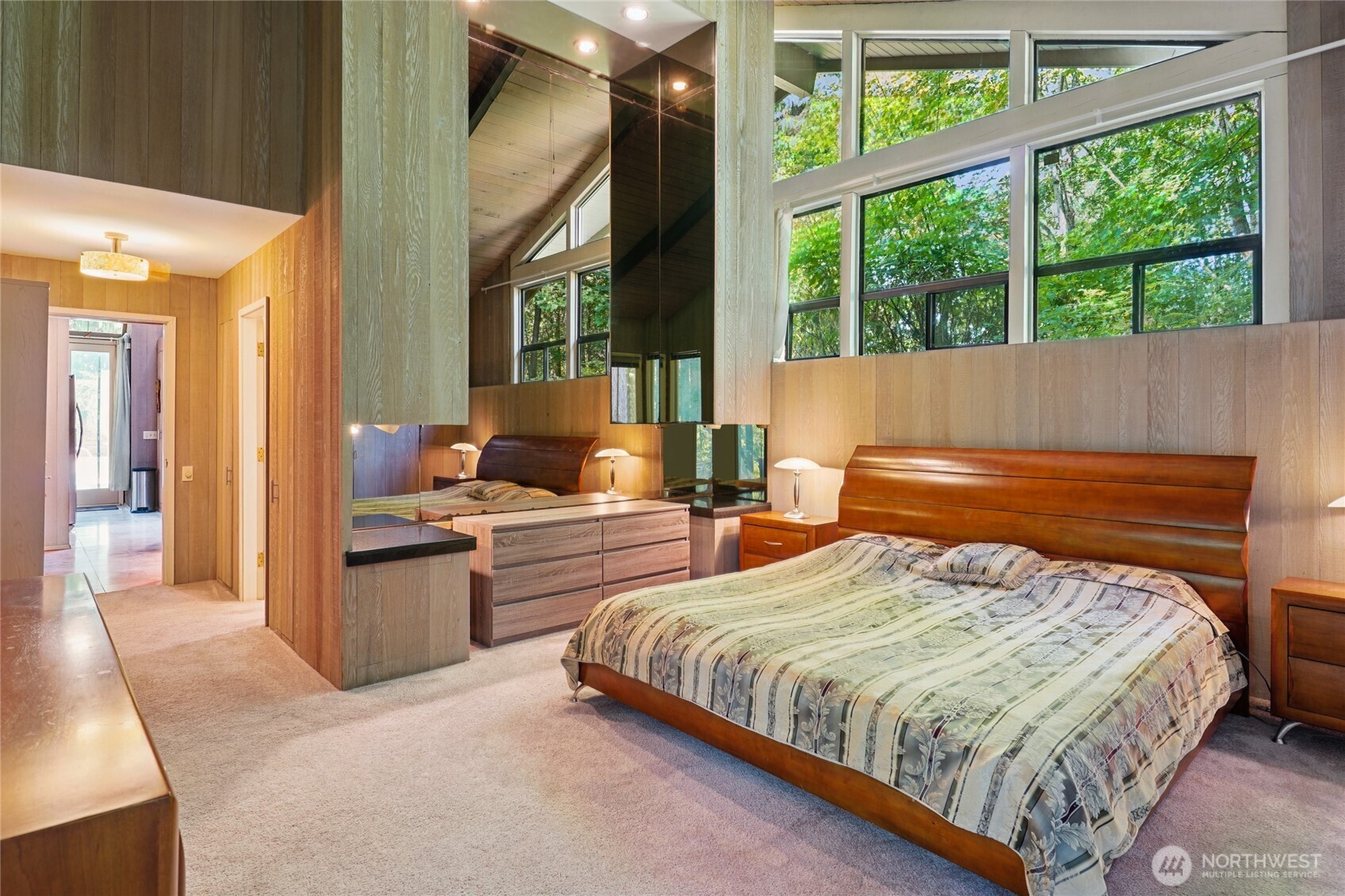 19419 Grannis Road Bothell, WA 98012 - Photo 14 of 40 a bedroom with a large bed and a large window
