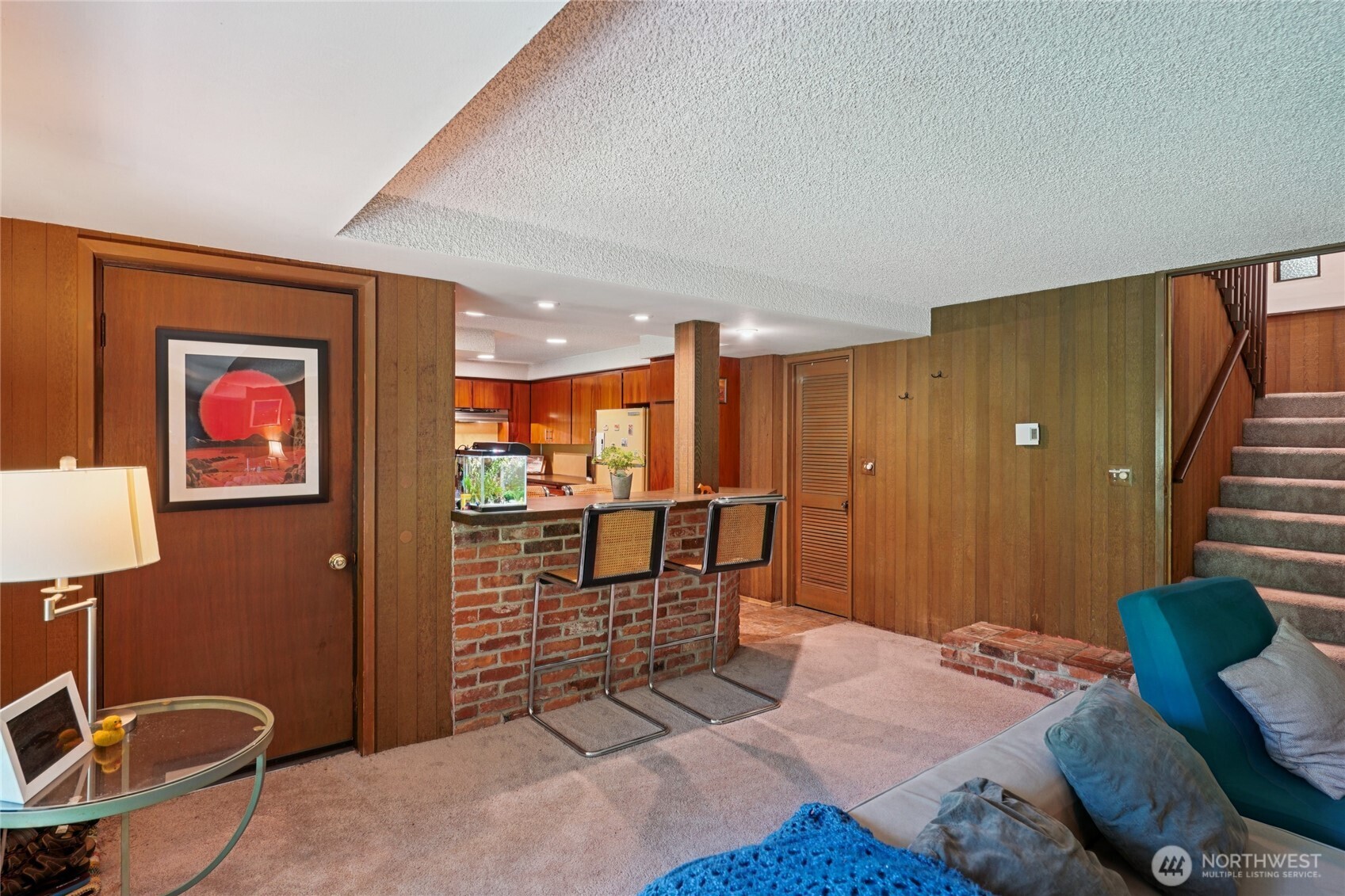 19419 Grannis Road Bothell, WA 98012 - Photo 26 of 40 a bedroom with furniture and a potted plant