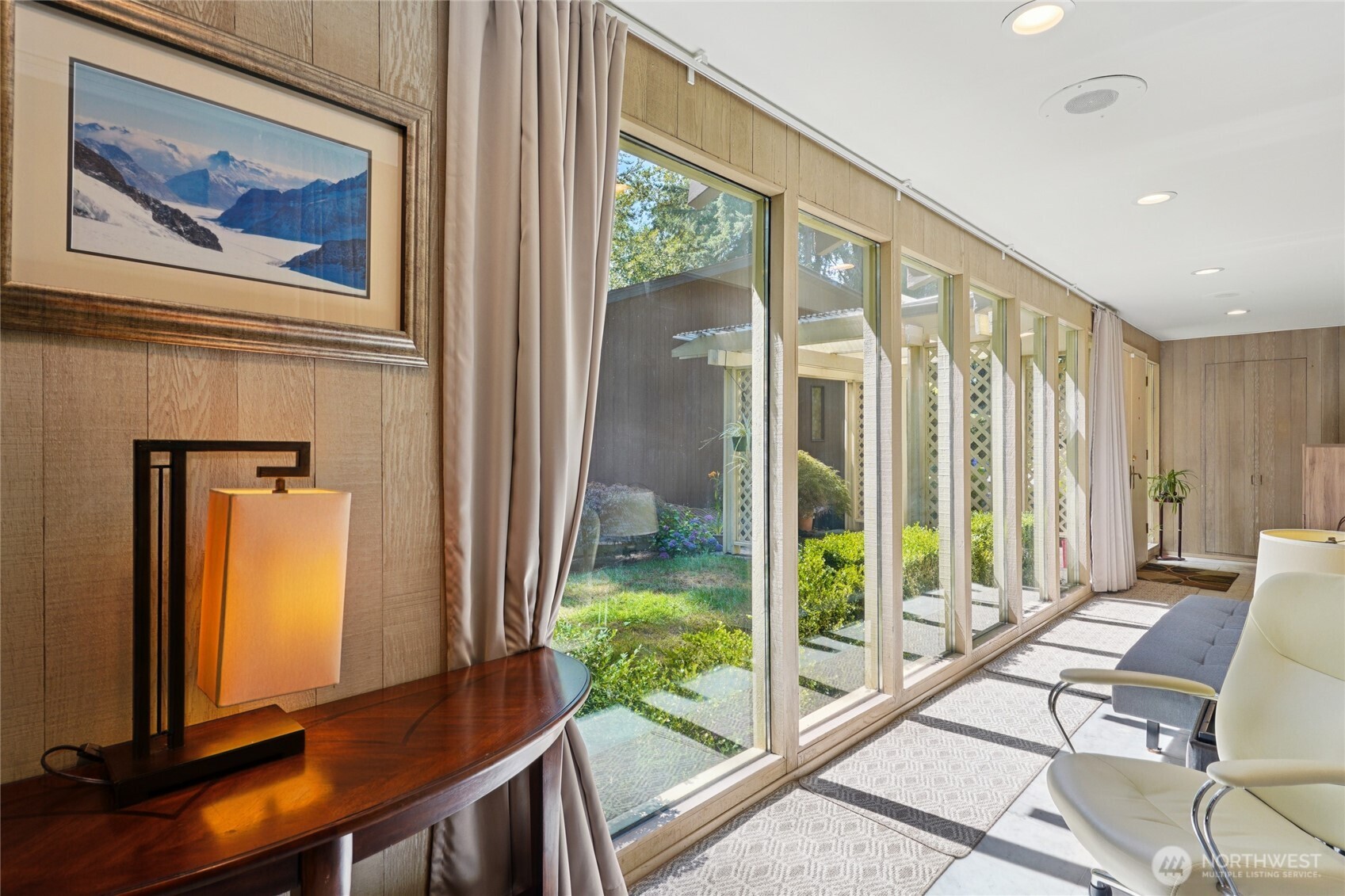 19419 Grannis Road Bothell, WA 98012 - Photo 7 of 40 a view of a room with a balcony and large window