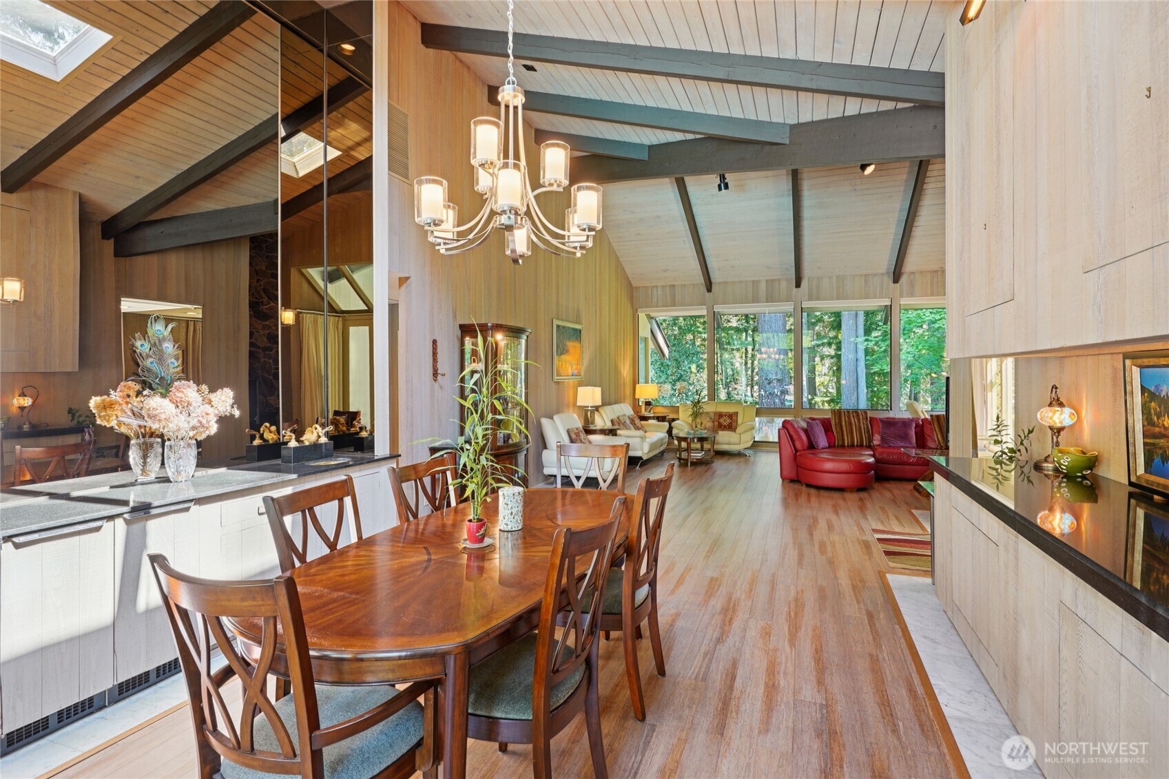 19419 Grannis Road Bothell, WA 98012 - Photo 8 of 40 a view of a dining room with furniture and a large window