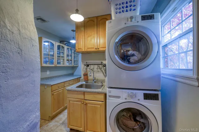 a utility room with dryer and washer