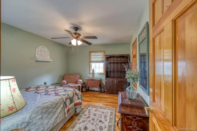 a bed room with a bed and a chandelier