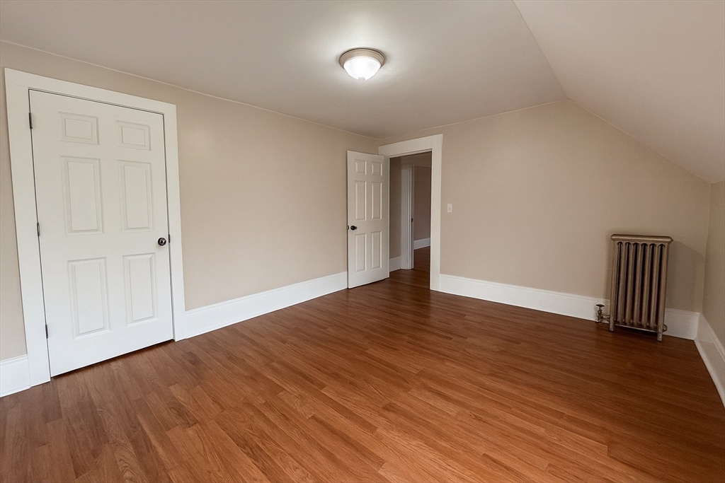 65 School Street Gardner, MA 01440 - Photo 20 of 21 a view of an empty room with wooden floor