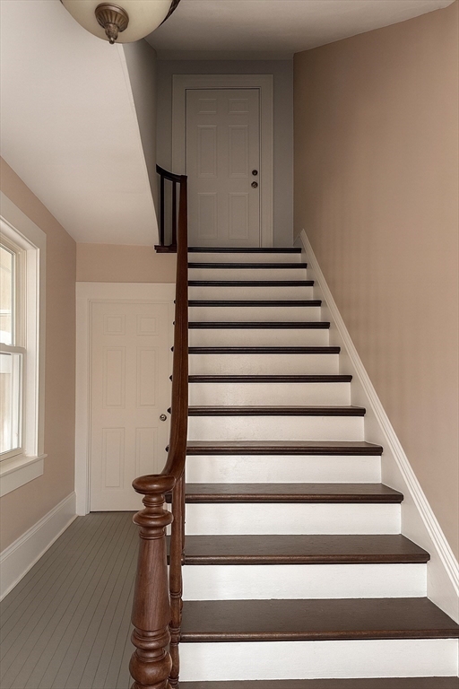 65 School Street Gardner, MA 01440 - Photo 4 of 21 a view of entryway and hall with wooden floor