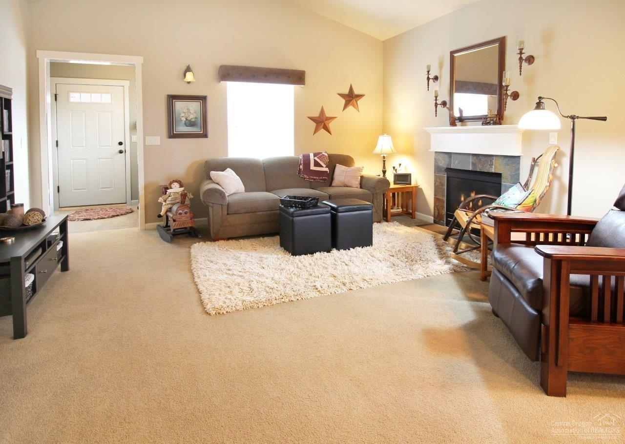 20730 Beaumont Drive Bend, OR 97701 - Photo 10 of 19 A comfortable living room with gas firep
