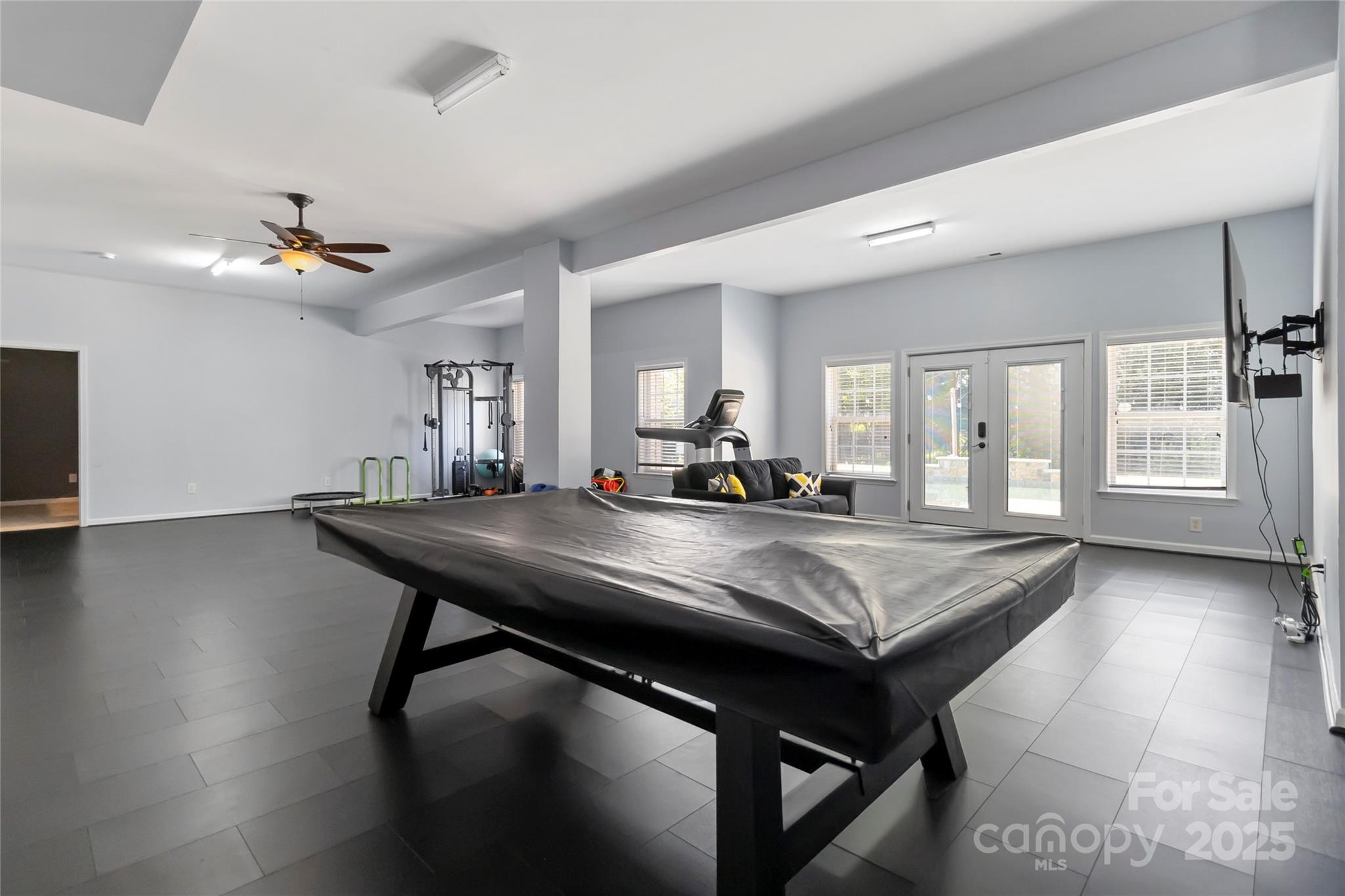 1009 Murandy Lane Matthews, NC 28104 - Photo 42 of 48 a view of a dining room with furniture window and wooden floor