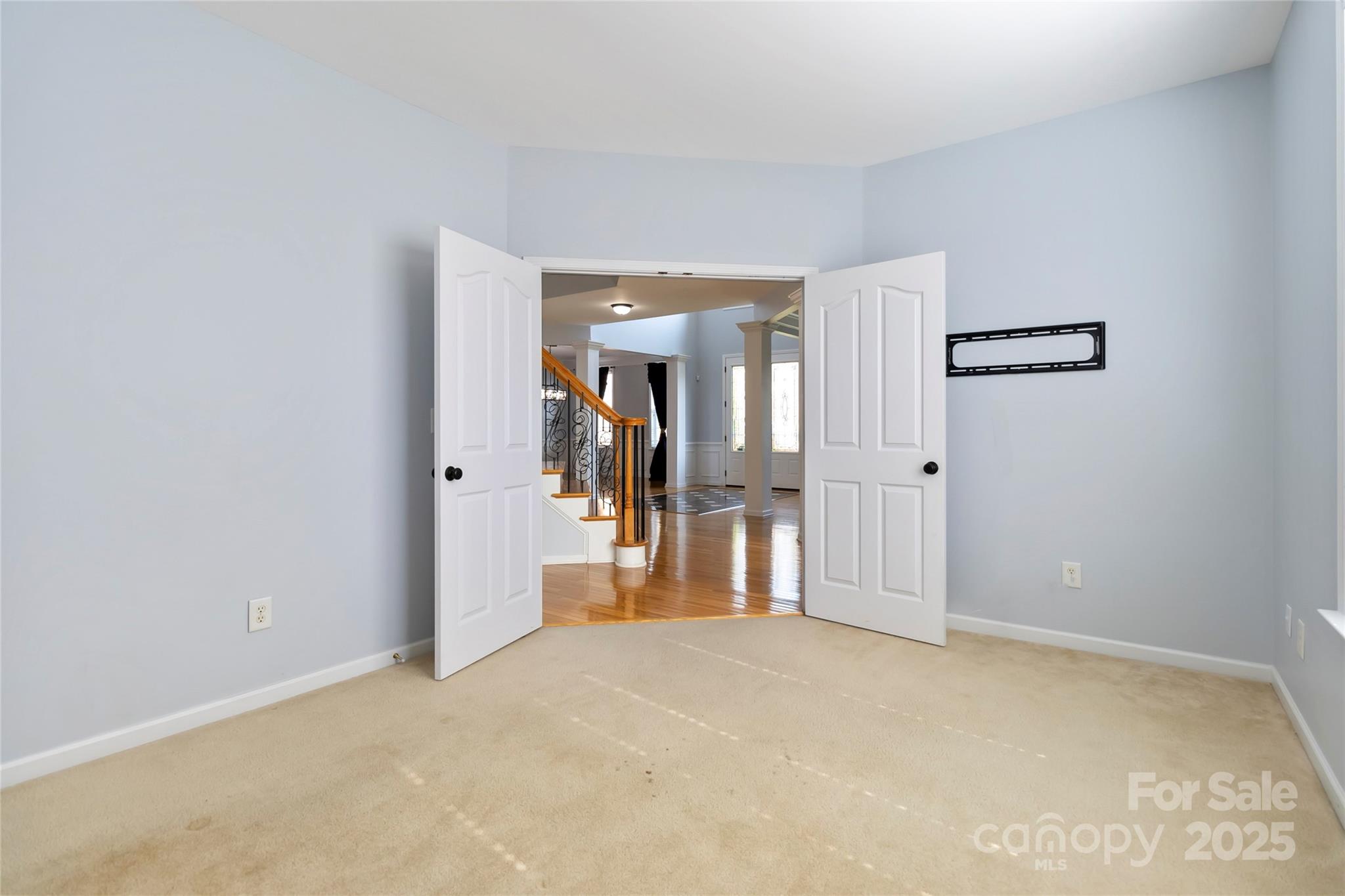 1009 Murandy Lane Matthews, NC 28104 - Photo 10 of 48 a view of a room with wooden walls