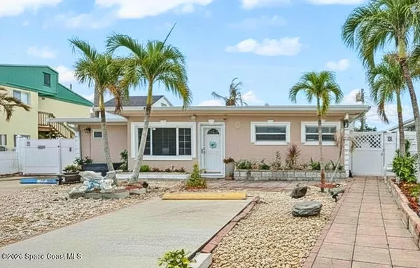 a front view of a house with swimming pool